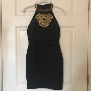 Gorgeous black and gold dress!